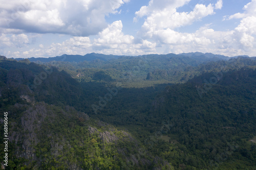 Arial view of rock mountain in with cloudy sky