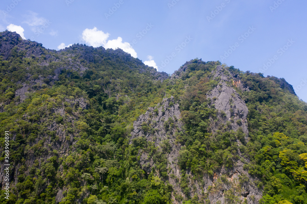 Arial view of rock mountain in with cloudy sky