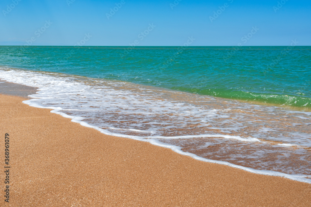 Beach with turquoise sea and yellow sand, resort summer background