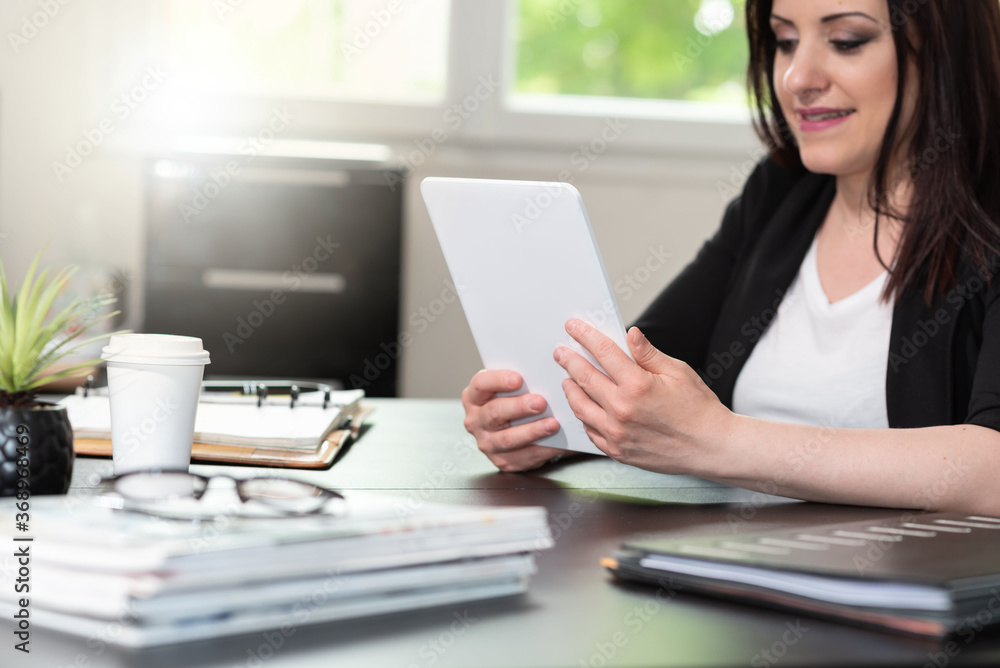 Businesswoman using digital tablet Businesswoman using digital tablet