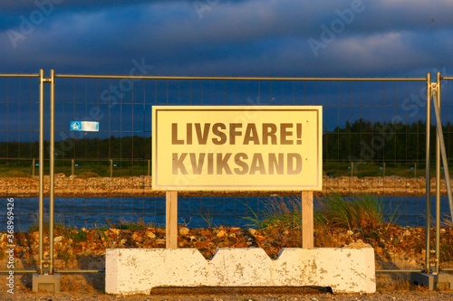 Hirtshals, Denmark   A sign in Danish saying: "Danger Quicksand"