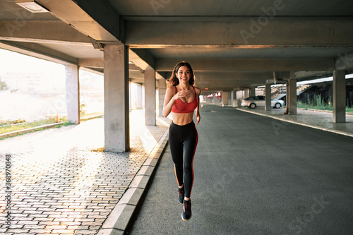 Woman running in urban environment