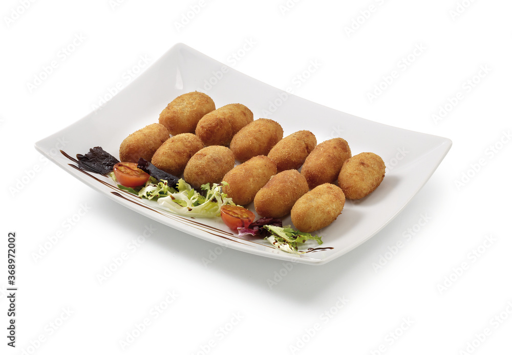 Croquettes with salad on white background Croquettes with salad on white background