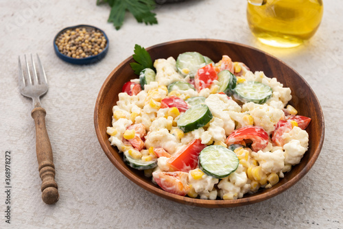 vegetable salad in wood plate food background