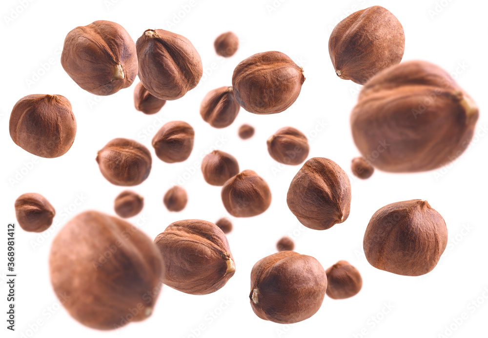Peeled hazelnut levitates on a white background Peeled hazelnut levitates on a white background