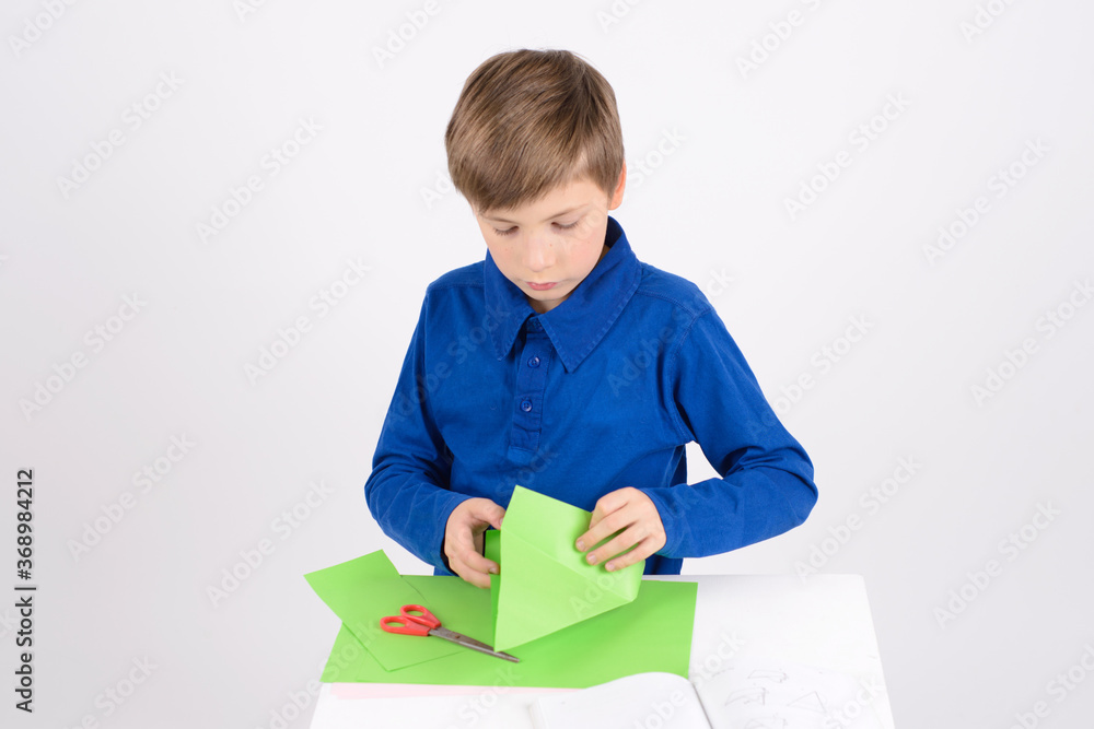 origami: the Boy is busy working on the product origami: the Boy is busy working on the product