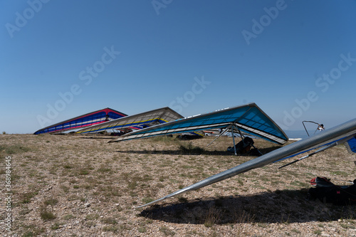 many hang gliders together in a competition