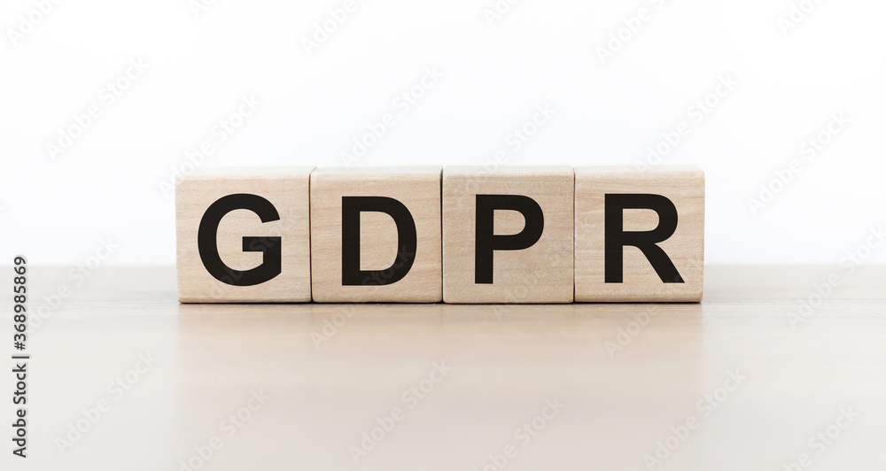 GDPR - symbol of the new General Data Protection Regulation on wooden blocks.Law concept. GDPR - symbol of the new General Data Protection Regulation on wooden blocks.Law concept.