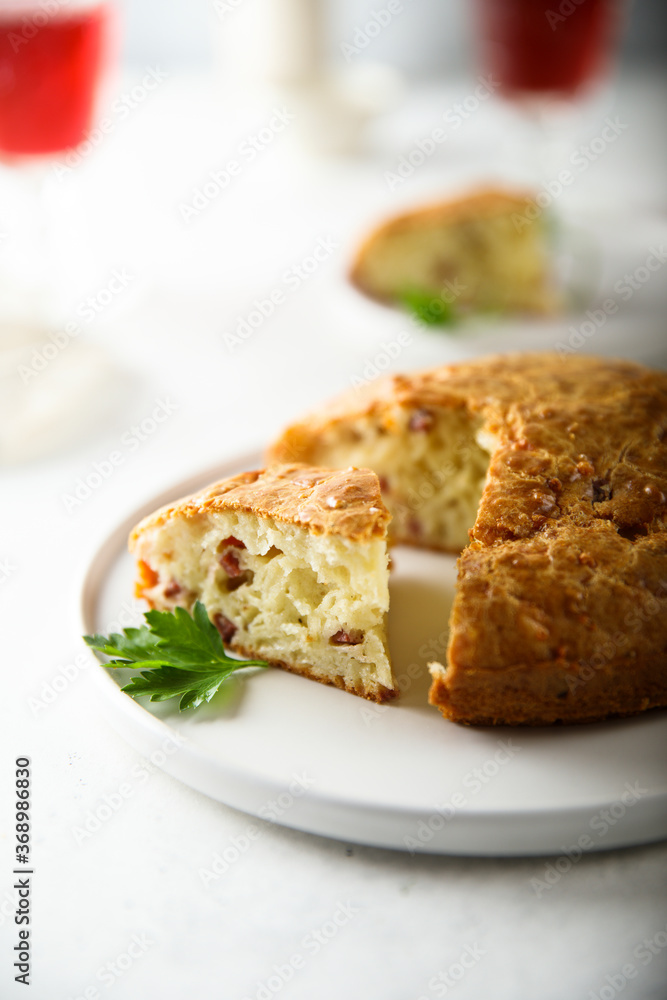 Homemade savory pie with cheese and bacon Homemade savory pie with cheese and bacon