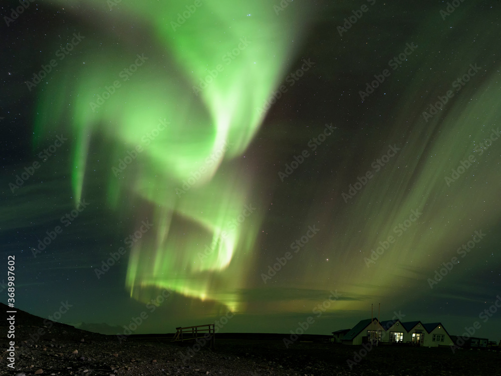 northern lights aurora in Jokulsarlon glacial river lagoon