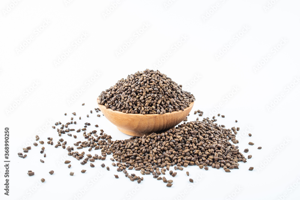 A saucer of cassia tea on white background A saucer of cassia tea on white background