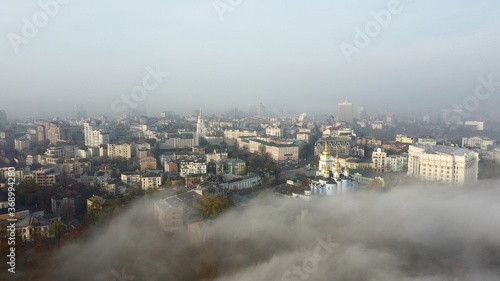 Aerial view of the city in the fog.