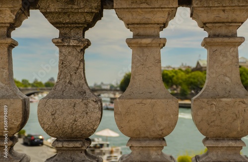 Stone Columns in Front of River Seine Paris 
