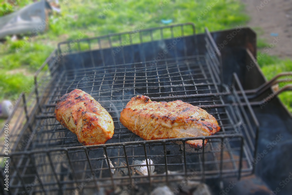 Grilled sausages at the stake Grilled sausages at the stake
