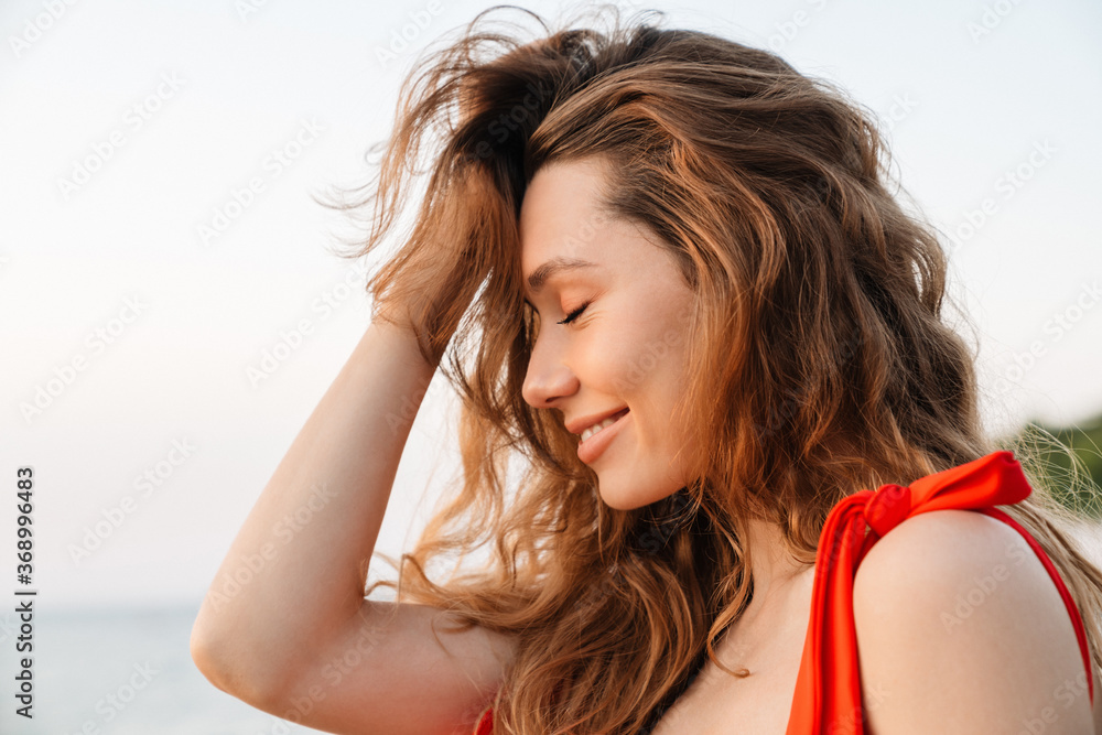 Beautiful smiling young woman wearing bikini Beautiful smiling young woman wearing bikini