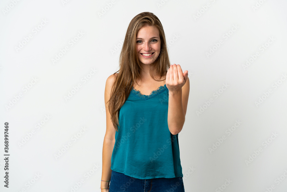 Young caucasian woman over isolated background inviting to come with hand. Happy that you came Young caucasian woman over isolated background inviting to come with hand. Happy that you came