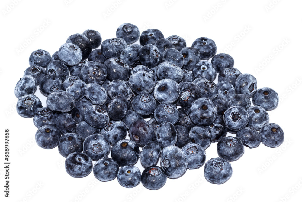 A handful of blueberries on white background. A handful of blueberries on white background.