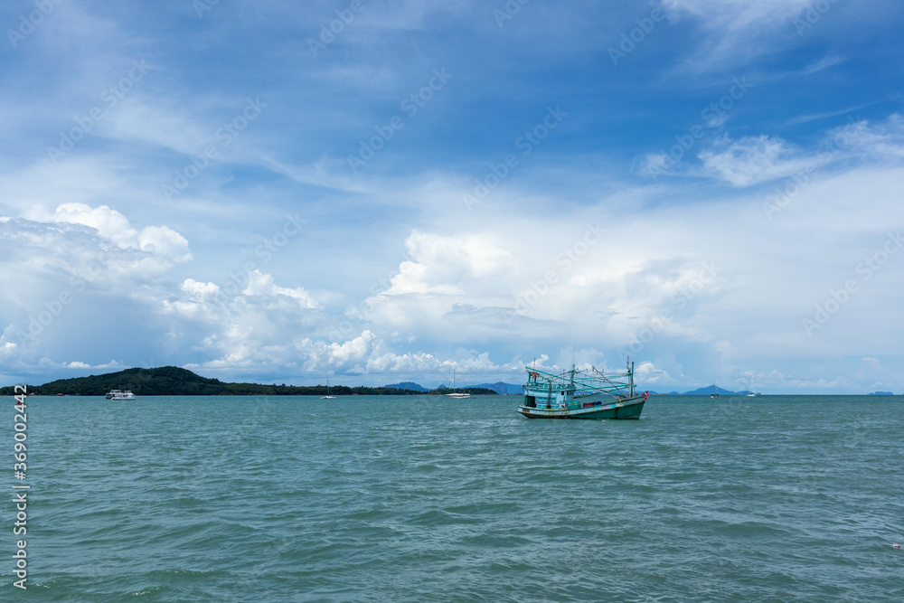Typical sea in Thailand with blue cloudy sky in normal day. Typical sea in Thailand with blue cloudy sky in normal day.