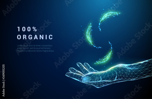 Abstract giving hand with falling green leafs.