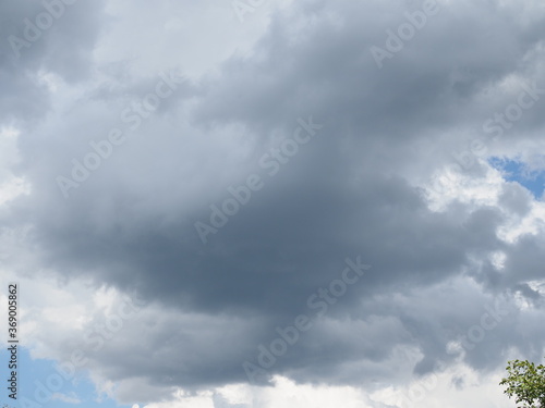 Cloudy sky full of deep grey clouds. Storm is coming.