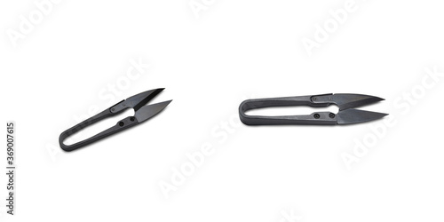 Black thread cutting scissors on a white background,with clipping path