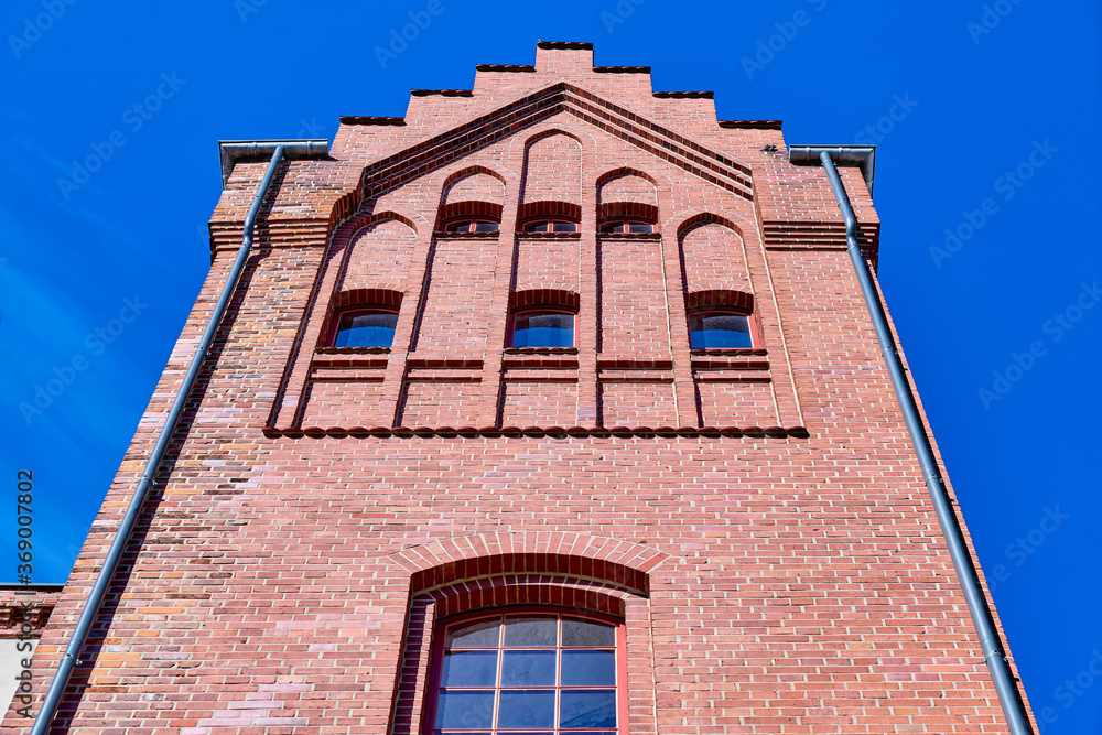 Beschaffenheit einer roten Ziegelsteinwand eines Gebäudes Beschaffenheit einer roten Ziegelsteinwand eines Gebäudes