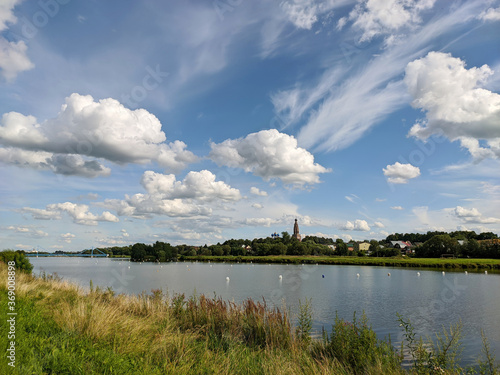 Lake Belskoe, Bronnitsy, Moscow region. Summer landscape. View of the Archangel Michael Cathedral.