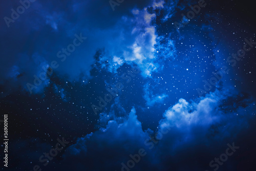 Photography Starry night sky with stars and moon in cloudscape background