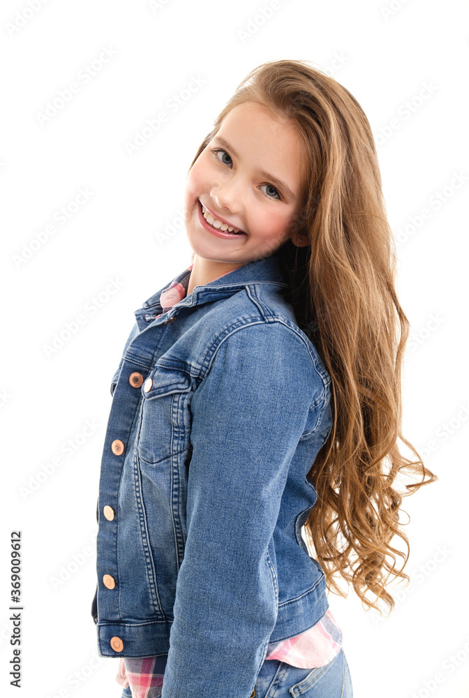 Obraz premium Portrait of adorable smiling little girl child preteen standing isolated