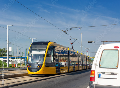Modern yellow tram, urban transport traffic in Budapest