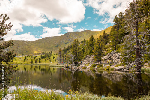 View in Windebenesee, Nockalmstreet, Austria. A Sunny sceanery with clouds in the sky photo