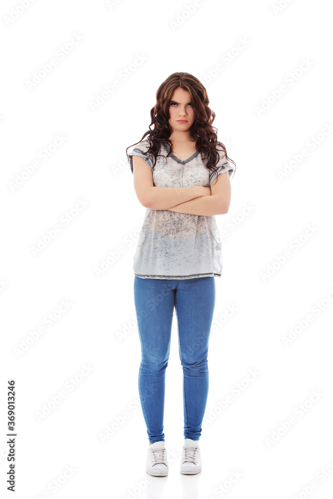 Portrait of angry young woman, unhappy and upset. Portrait of angry young woman, unhappy and upset.