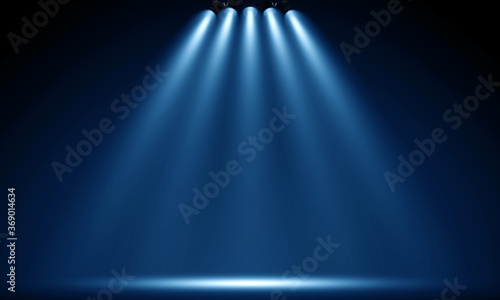 Spotlights illuminate empty stage photo