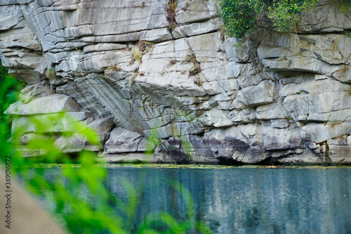 a large sheer cliff above the water