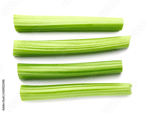 фотографія Fresh celery sticks top view isolated on white background