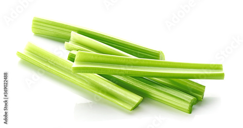 Fresh celery sticks isolated on white background
