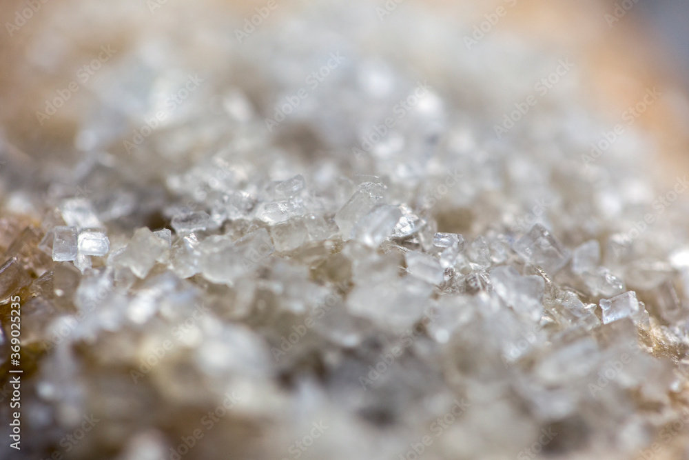 Close up on sugar granules on a pastry Close up on sugar granules on a pastry