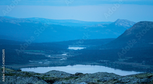 Blur hour shot of mountain lake, mountain scenery and layers. Peaceful scenery. Landscape shot.