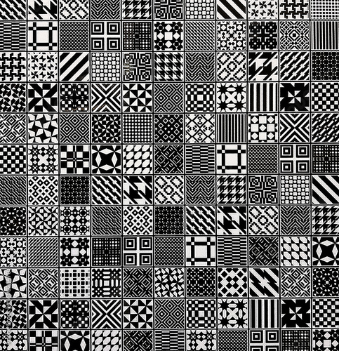 Monochrome texture with ornaments for interior design project and background. Black and white ceramic tile with geometric and floral pattern for wall and floor decoration.