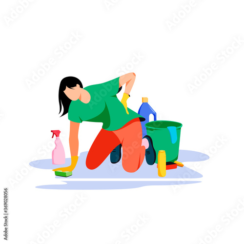 Sad woman tired of housework surrounded by cleaning supplies. Sore back from over work. Bucket, gloves, cleaning agent.
