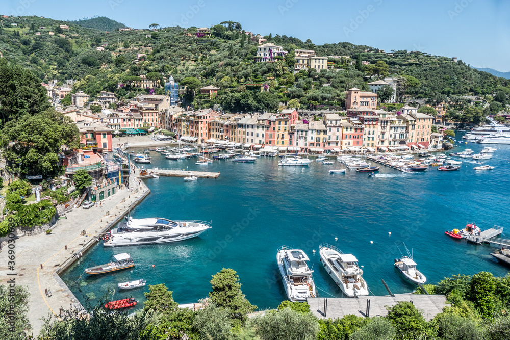 Aerial view of Portofino with many colorful houses and boats