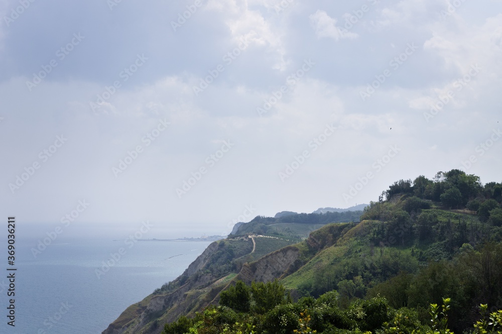 Panoramic view of 'Monte San Bartolo National Park' with vineyards above Adriatic sea (Pesaro, Marche, Italy, Europe)