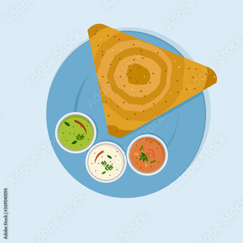 Indian breakfast dish 'Dosa with Sambar and Chutney' on a plate