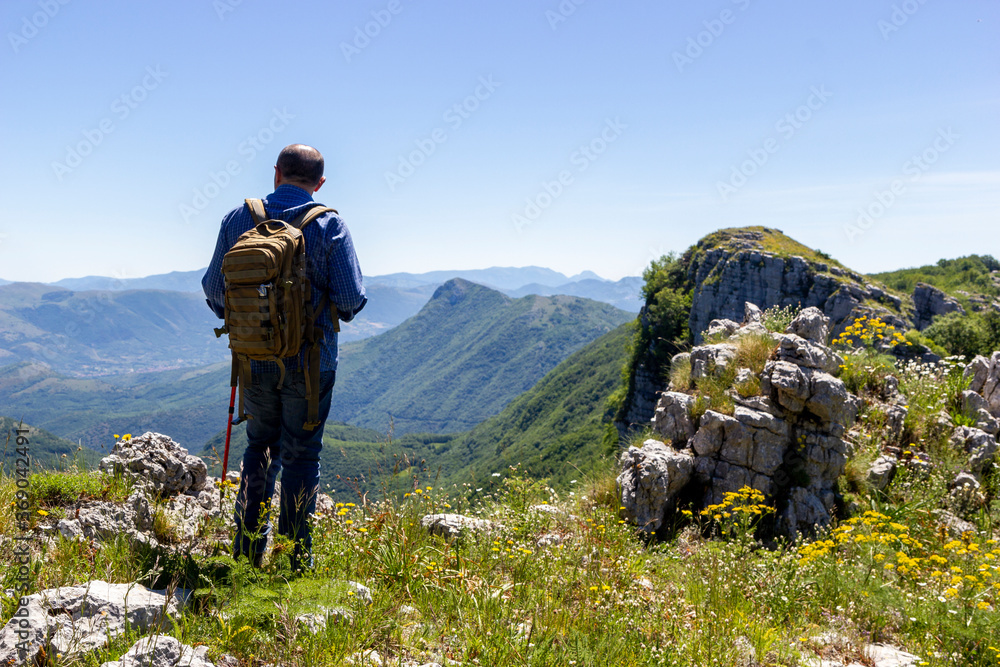 hiker on the top of a mountain in Alburni massif