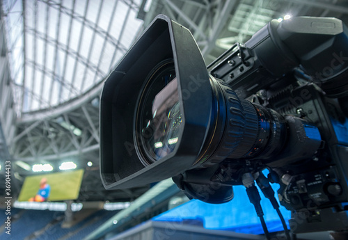Fotografie tv camera in the football stadium before the game.
