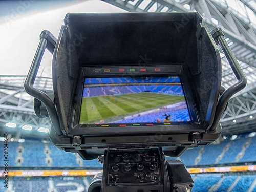 Fototapeta Naklejka Na Ścianę i Meble -  tv camera in the football stadium before the game.