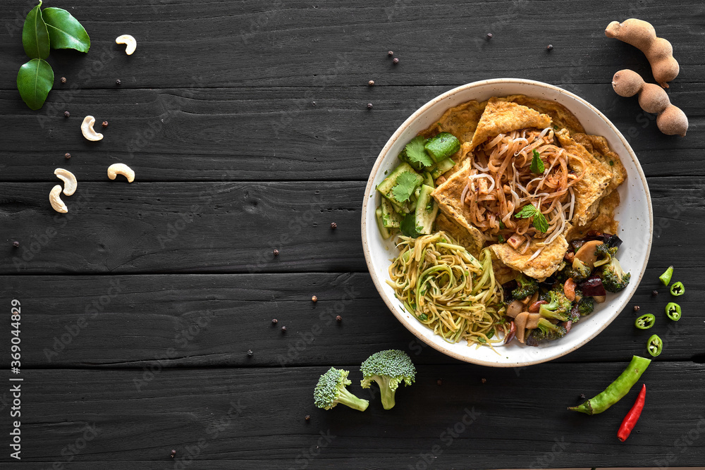 Vegetarian Pad Thai, Thai Food, Thailand's dishes on a black wood background