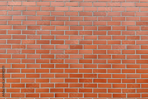 Portrait of brown brick wall as abstract background