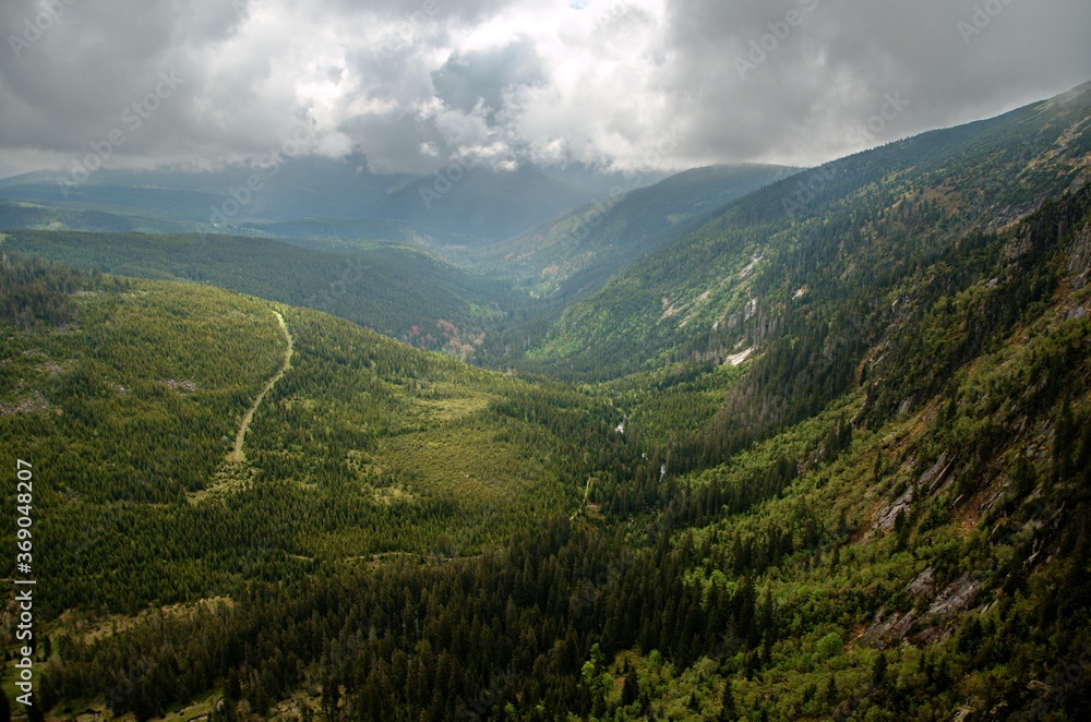 Naklejka premium mountain landscape with clouds