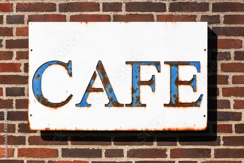 Cafe sign on a wall